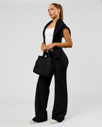 Woman wearing Fusion V-Contour High-Rise Tall Pant - Black | Model:Claire | Size:S | Thumbnail Index: 4