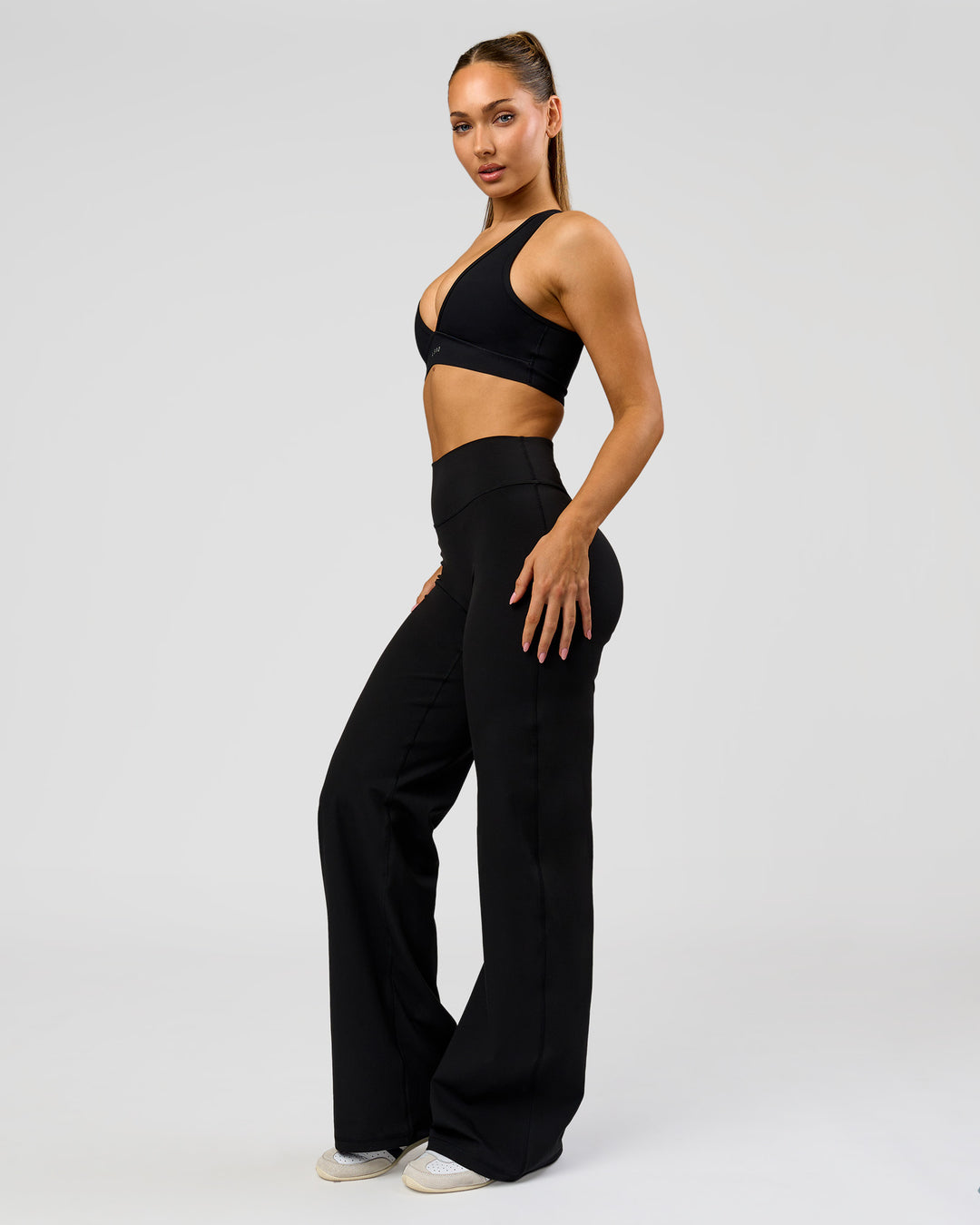 Woman wearing Fusion V-Contour High-Rise Tall Pant - Black | Model:Claire | Size:S - view 10