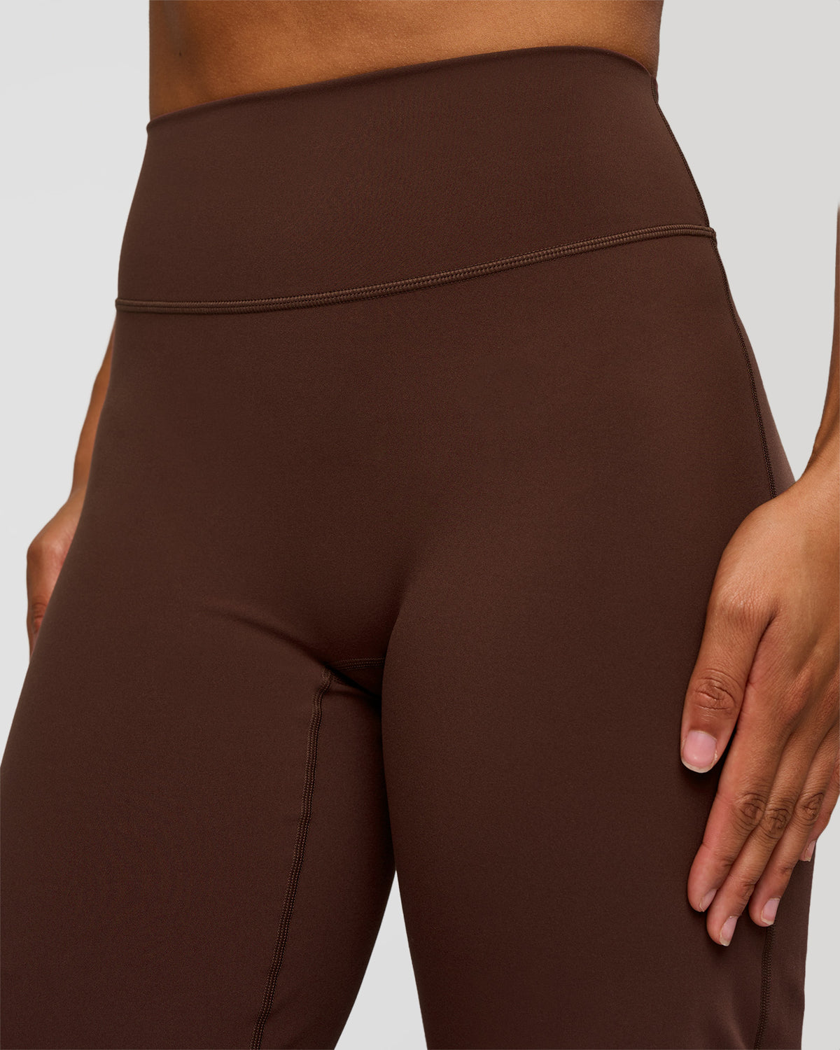 Woman wearing Fusion V-Contour High-Rise Tall Pant - Hot Chocolate | Model:Rosie | Size:S
