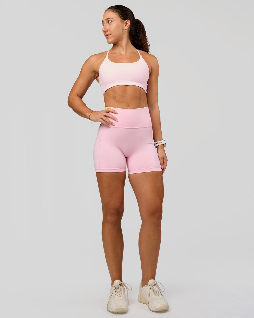 Woman wearing Fusion V-Contour Ultra High-Rise 4” Short Pockets - Marshmallow | Model:Summer | Size:S - view 3