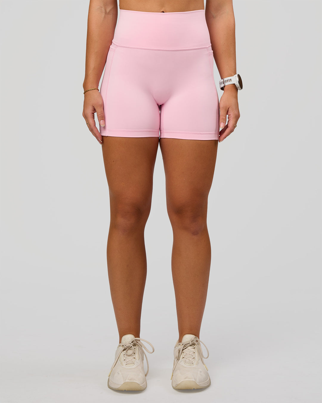 Woman wearing Fusion V-Contour Ultra High-Rise 4” Short Pockets - Marshmallow | Model:Summer | Size:S - view 4