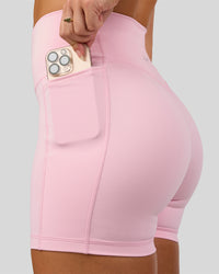 Woman wearing Fusion V-Contour Ultra High-Rise 4” Short Pockets - Marshmallow | Model:Summer | Size:S | Thumbnail Index: 0