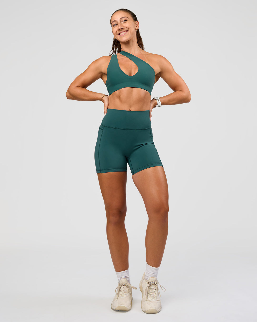 Woman wearing Fusion V-Contour Ultra High-Rise 4” Short Pockets - Transformative Teal | Model:Summer | Size:S - view 5