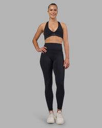 Woman wearing Fusion V-Contour Ultra High-Rise Full Length Legging Pockets - Black | Model:Charlize | Size:S | Thumbnail Index: 3
