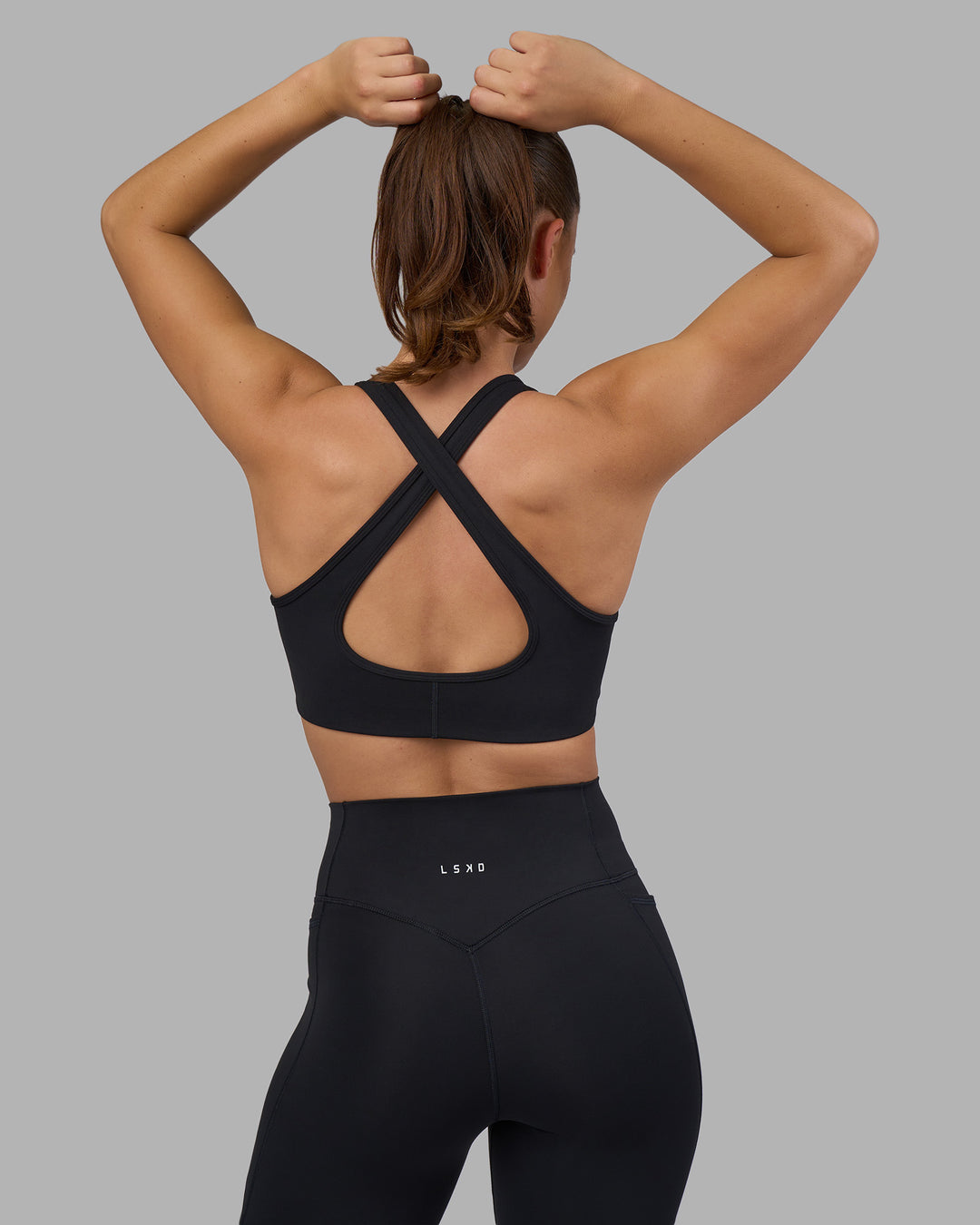 Woman wearing Fusion V-Contour Ultra High-Rise Full Length Legging Pockets - Black | Model:Charlize | Size:S - view 10
