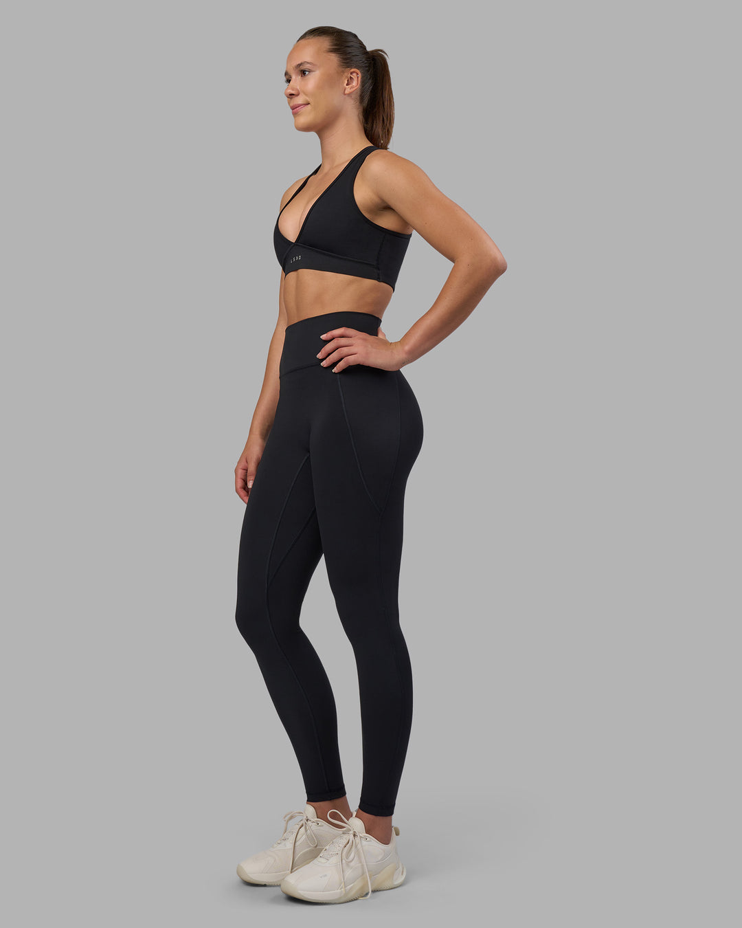 Woman wearing Fusion V-Contour Ultra High-Rise Full Length Legging Pockets - Black | Model:Charlize | Size:S - view 12