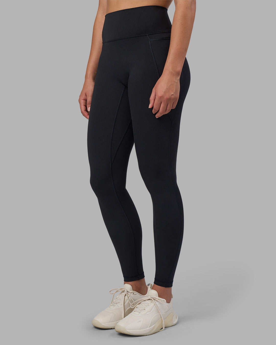 Woman wearing Fusion V-Contour Ultra High-Rise Full Length Legging Pockets - Black | Model:Charlize | Size:S - view 3