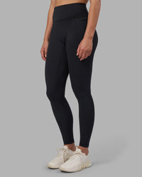 Woman wearing Fusion V-Contour Ultra High-Rise Full Length Legging Pockets - Black | Model:Charlize | Size:S | Thumbnail Index: 2