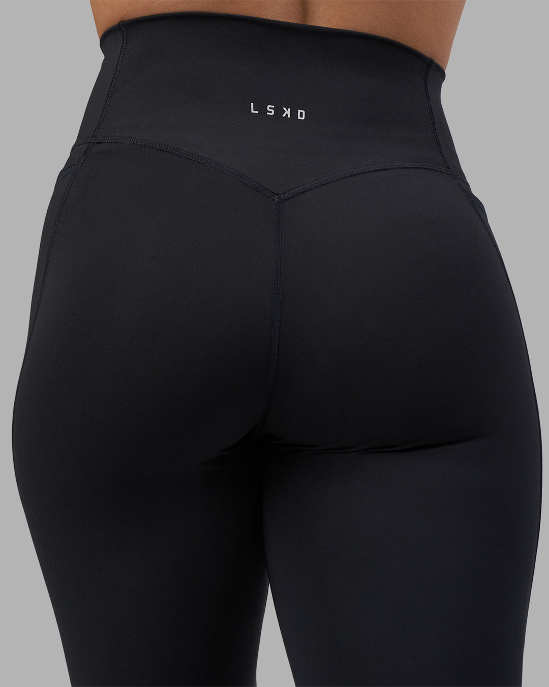 Woman wearing Fusion V-Contour Ultra High-Rise Full Length Legging Pockets - Black | Model:Charlize | Size:S - view 13