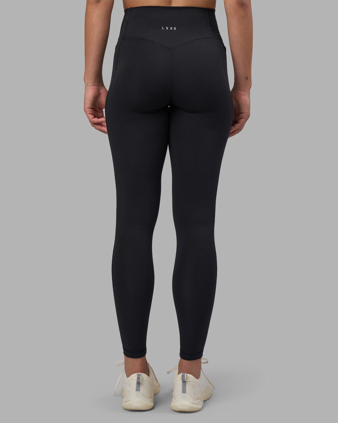 Woman wearing Fusion V-Contour Ultra High-Rise Full Length Legging Pockets - Black | Model:Charlize | Size:S - view 14
