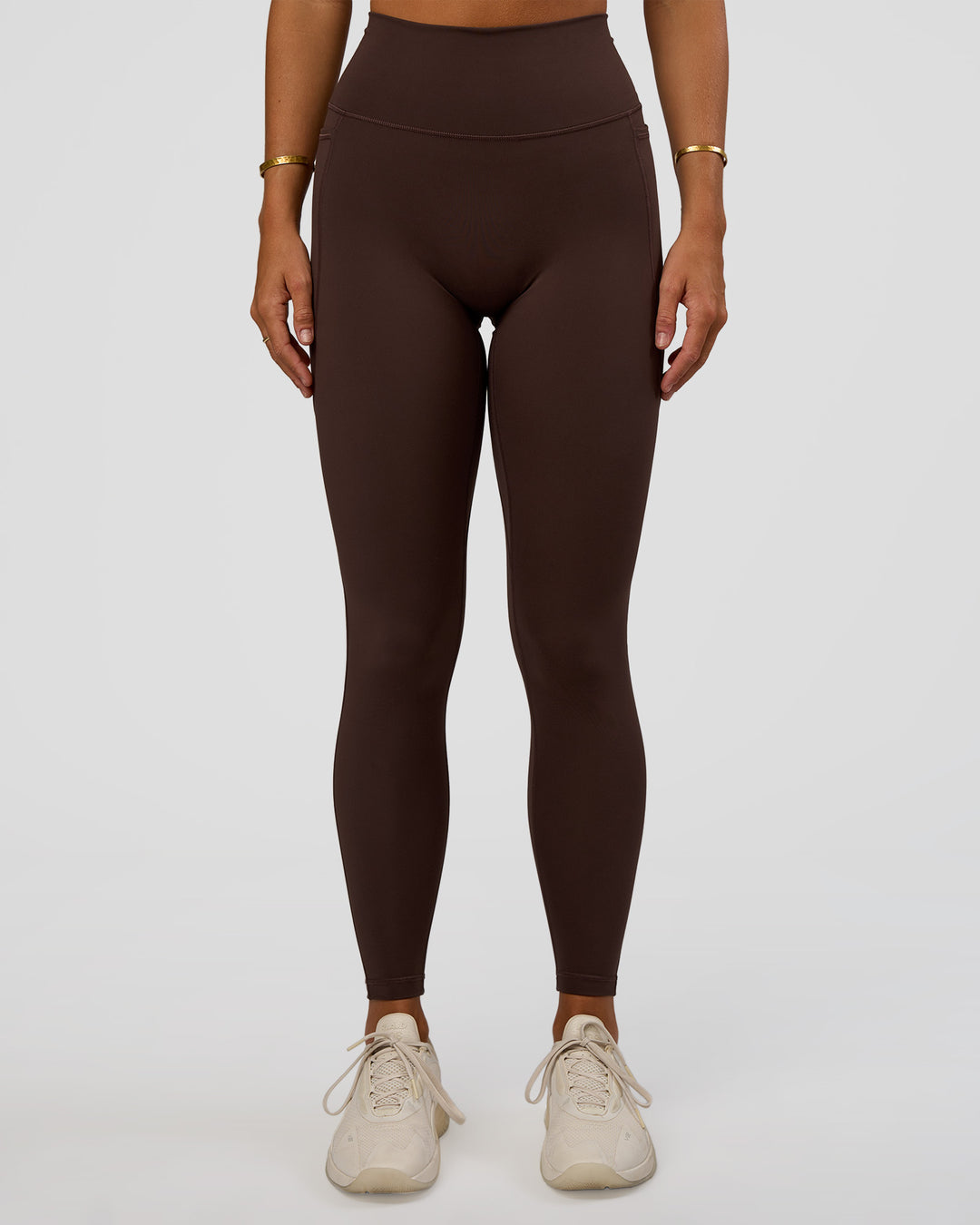 Woman wearing Fusion V-Contour Ultra High-Rise Full Length Legging Pockets - Hot Chocolate | Model:Amity | Size:S - view 4
