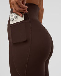 Woman wearing Fusion V-Contour Ultra High-Rise Full Length Legging Pockets - Hot Chocolate | Model:Amity | Size:S | Thumbnail Index: 2