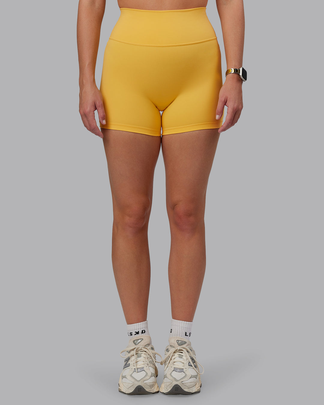 Woman wearing Fusion Ultra High-Rise 4" Short - Banana Cream | Model:Lillie | Size:S - view 6