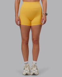 Woman wearing Fusion Ultra High-Rise 4" Short - Banana Cream | Model:Lillie | Size:S | Thumbnail Index: 5