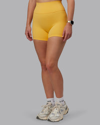 Woman wearing Fusion Ultra High-Rise 4" Short - Banana Cream | Model:Lillie | Size:S | Thumbnail Index: 2