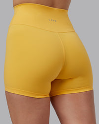 Woman wearing Fusion Ultra High-Rise 4" Short - Banana Cream | Model:Lillie | Size:S | Thumbnail Index: 7