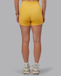 Woman wearing Fusion Ultra High-Rise 4" Short - Banana Cream | Model:Lillie | Size:S | Thumbnail Index: 6