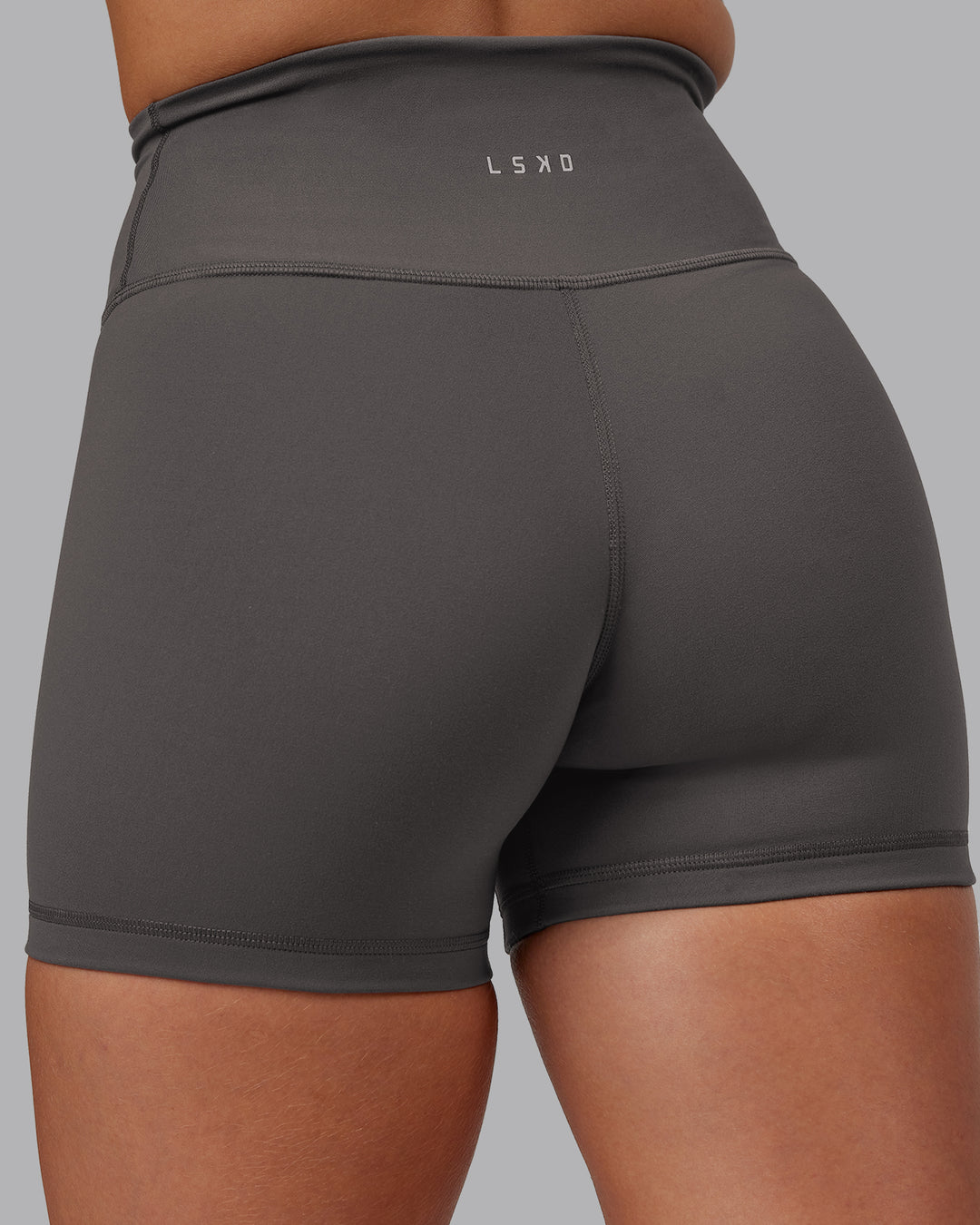 Woman wearing Fusion Ultra High-Rise 4" Short - Dark Storm | Model:Hannah | Size:S - view 8