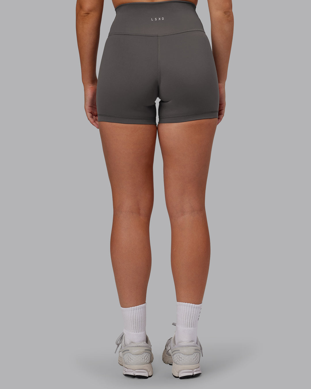 Woman wearing Fusion Ultra High-Rise 4" Short - Dark Storm | Model:Hannah | Size:S - view 6