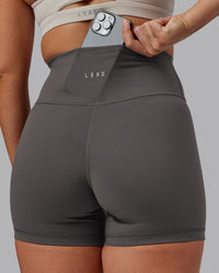 Woman wearing Fusion Ultra High-Rise 4" Short - Dark Storm | Model:Hannah | Size:S | Thumbnail Index: 3