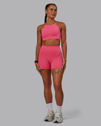 Woman wearing Fusion Ultra High-Rise 4" Short Pockets - Hot Pink | Model:Vanessa | Size:S | Thumbnail Index: 4