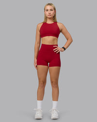 Woman wearing Fusion Ultra High-Rise 4" Short Pockets - Cherry Red | Model:Halle | Size:S | Thumbnail Index: 4