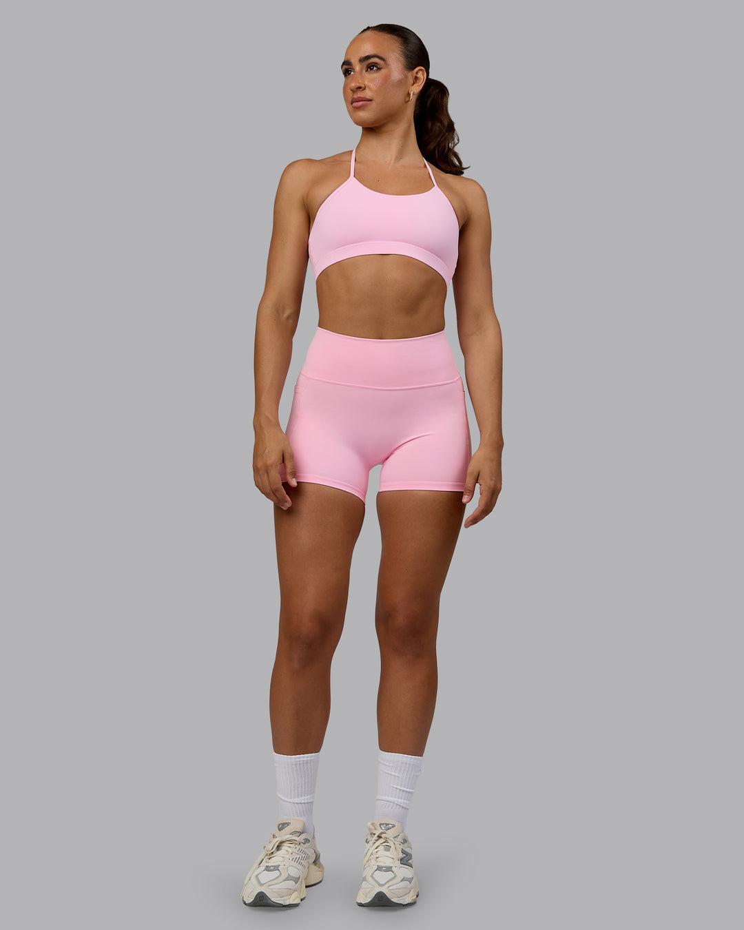 Woman wearing Fusion Ultra High-Rise 4" Short Pockets - Pale Pink | Model:Sophie | Size:S - view 4