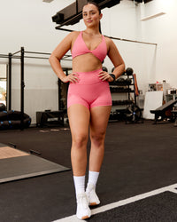 Woman wearing Fusion Ultra High-Rise 4" Short Pockets - Pink Lemonade | Model:Charlotte | Size:S | Thumbnail Index: 2