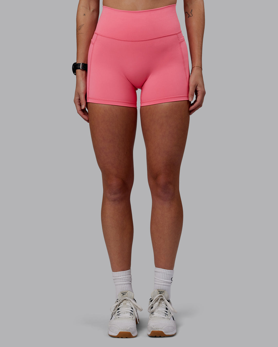 Woman wearing Fusion Ultra High-Rise 4" Short Pockets - Pink Lemonade | Model:Shae | Size:S - view 4