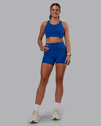Woman wearing Fusion Ultra High-Rise 4" Short Pockets - Blue Quartz | Model:Phoebe | Size:S | Thumbnail Index: 6