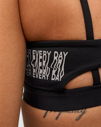 Woman wearing Galvanise Hype Graphic Sports Bra 2.0 - Black-Alloy | Model:Rhiley | Size:S | Thumbnail Index: 4