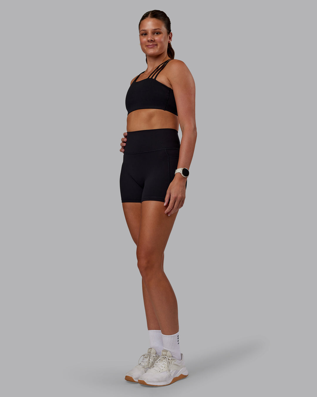 Woman wearing Galvanise Sports Bra 2.0 - Black | Model:Phoebe | Size:S - view 3