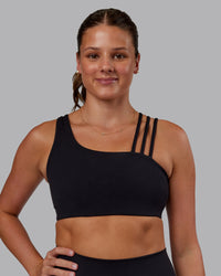 Woman wearing Galvanise Sports Bra 2.0 - Black | Set:true | Angle:front | Model:Phoebe | Size:S | Thumbnail Index: 0
