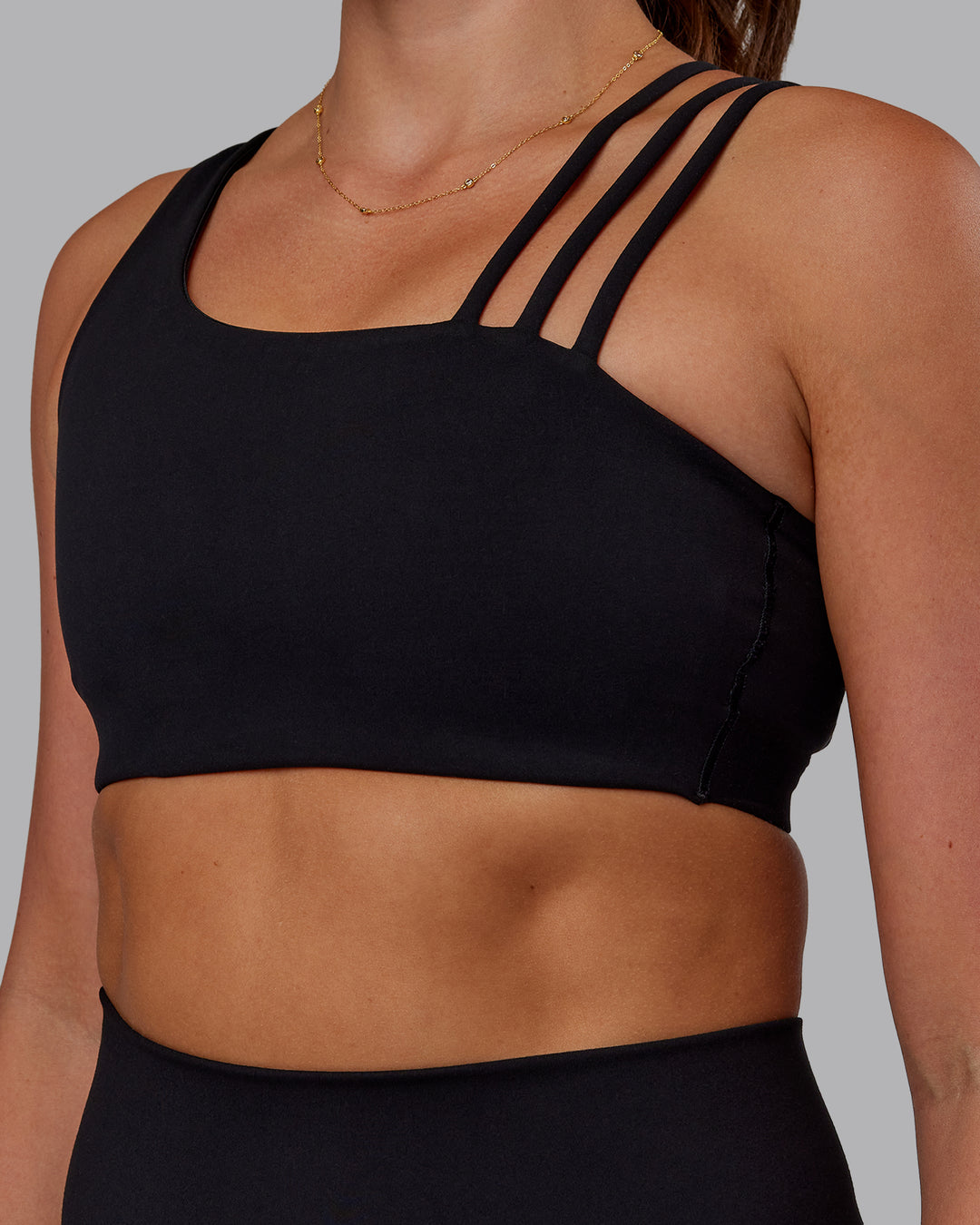 Woman wearing Galvanise Sports Bra 2.0 - Black | Set:true | Angle:closeup | Model:Phoebe | Size:S - view 4