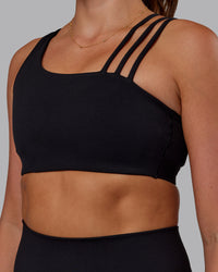 Woman wearing Galvanise Sports Bra 2.0 - Black | Set:true | Angle:closeup | Model:Phoebe | Size:S | Thumbnail Index: 3