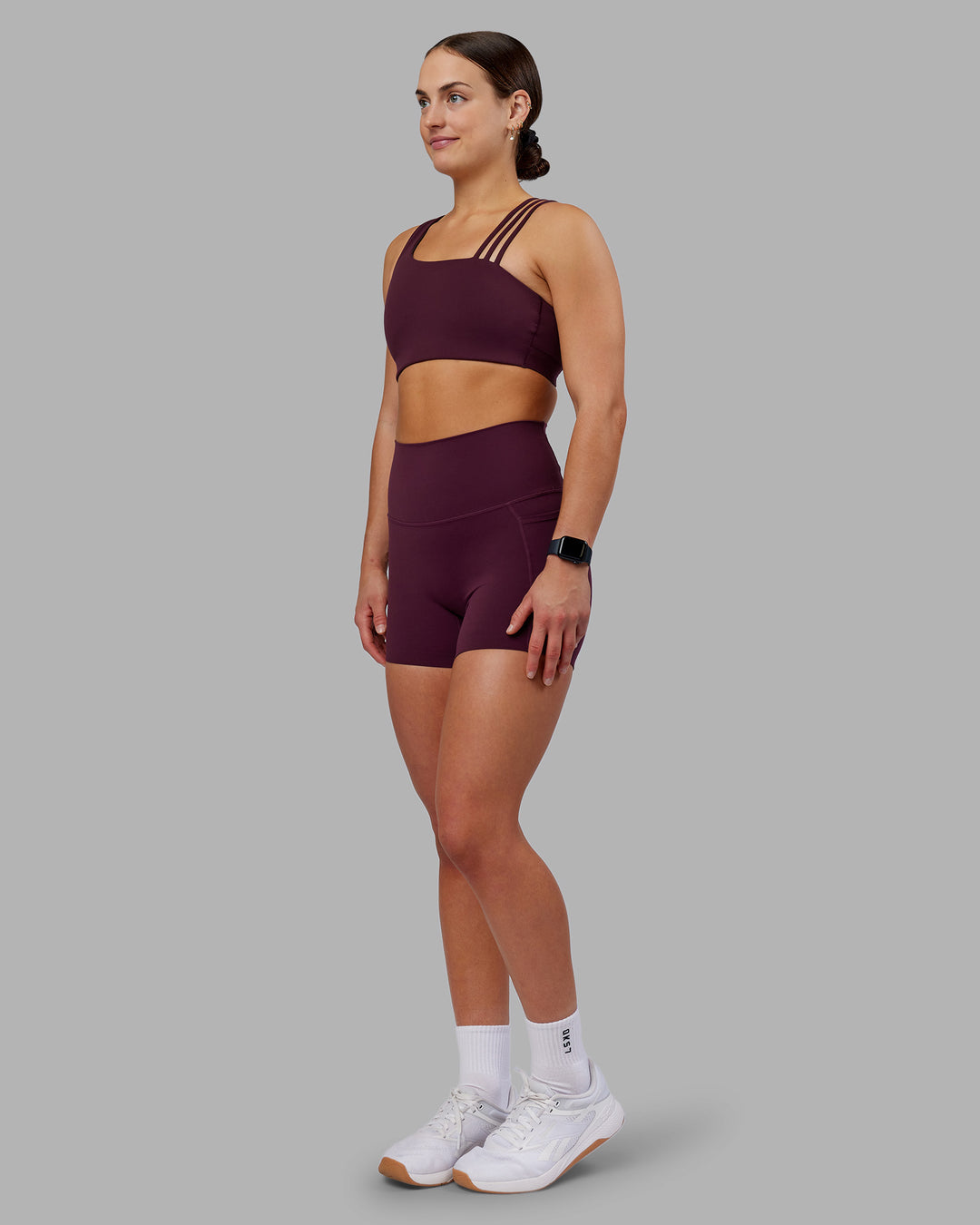 Woman wearing Galvanise Sports Bra 2.0 - Cherry Lacquer | Model:Keisha | Size:S - view 3