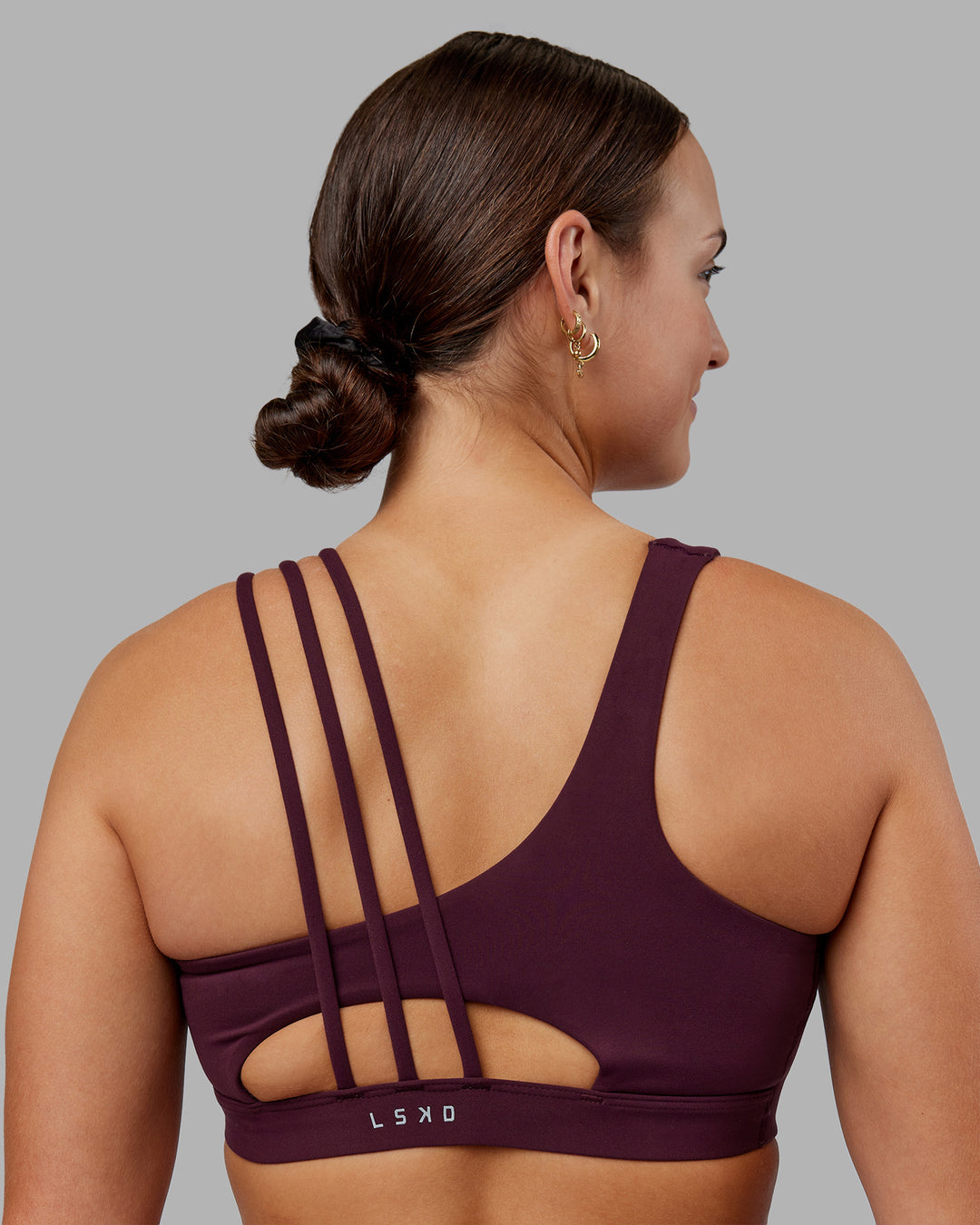 Woman wearing Galvanise Sports Bra 2.0 - Cherry Lacquer | Model:Keisha | Size:S - view 5