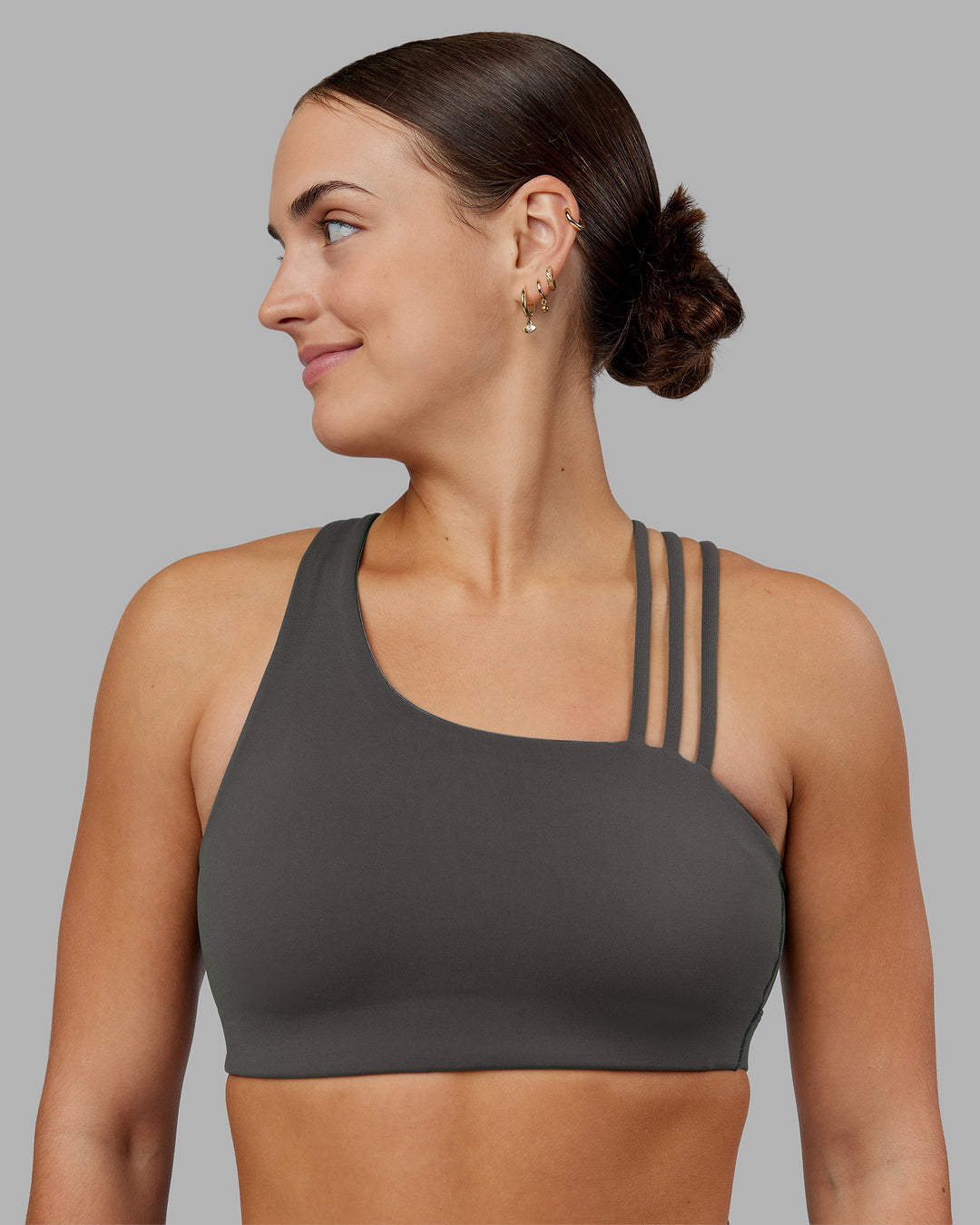 Woman wearing Galvanise Sports Bra 2.0 - Dark Storm | Set:true | Angle:front | Model:Keisha | Size:S - view 3