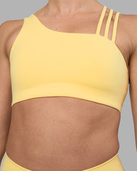 Woman wearing Galvanise Sports Bra 2.0 - Lemon | Set:true | Angle:closeup | Model:Sophie | Size:S | Thumbnail Index: 3