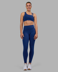 Woman wearing Galvanise Sports Bra 2.0 - Midnight Blue | Model:Charlize | Size:S | Thumbnail Index: 2