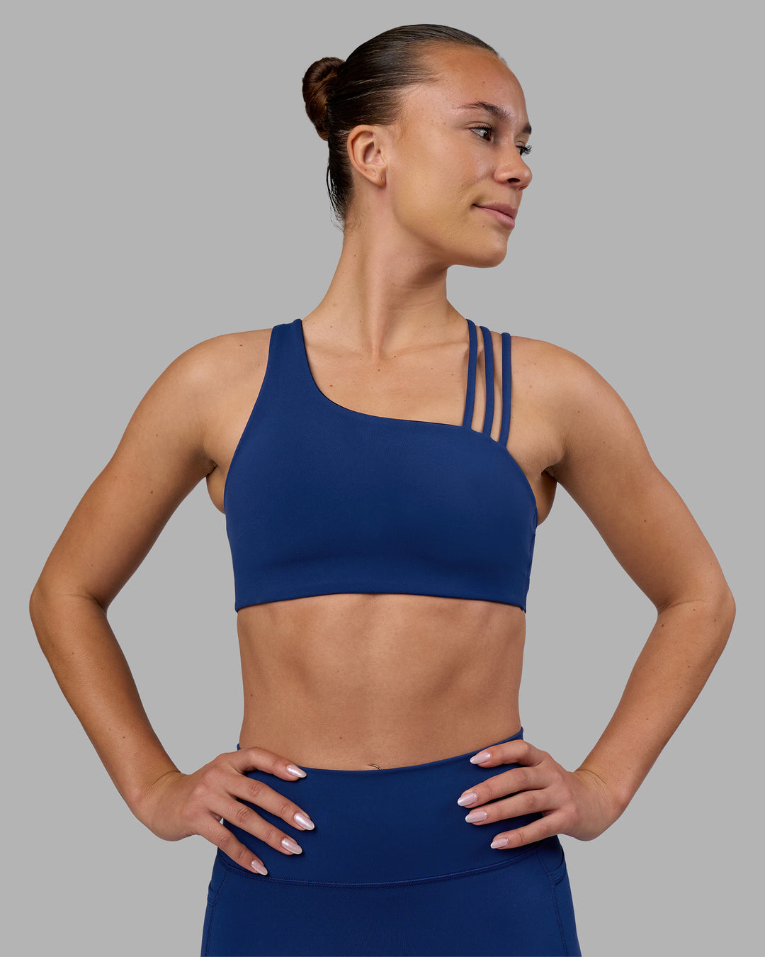Woman wearing Galvanise Sports Bra 2.0 - Midnight Blue | Set:true | Angle:front | Model:Charlize | Size:S - view 5