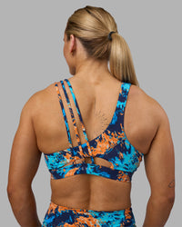 Woman wearing Galvanise Sports Bra 2.0 - React Print | Set:true | Angle:back | Model:Georgia | Size:S | Thumbnail Index: 0