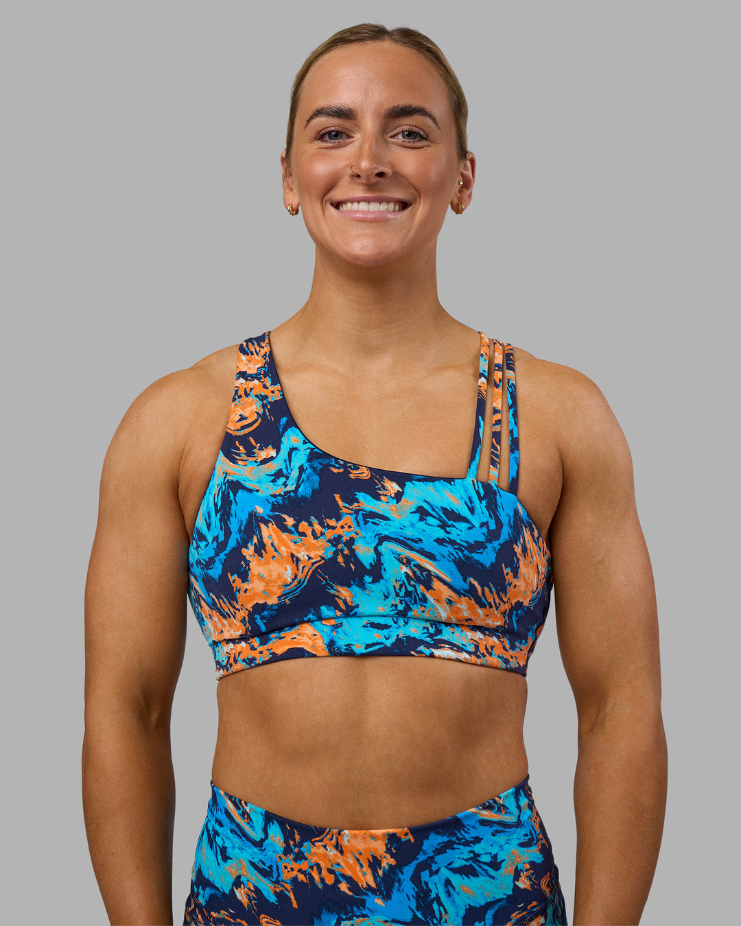 Woman wearing Galvanise Sports Bra 2.0 - React Print | Set:true | Angle:front | Model:Georgia | Size:S - view 4