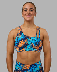 Woman wearing Galvanise Sports Bra 2.0 - React Print | Set:true | Angle:front | Model:Georgia | Size:S | Thumbnail Index: 3
