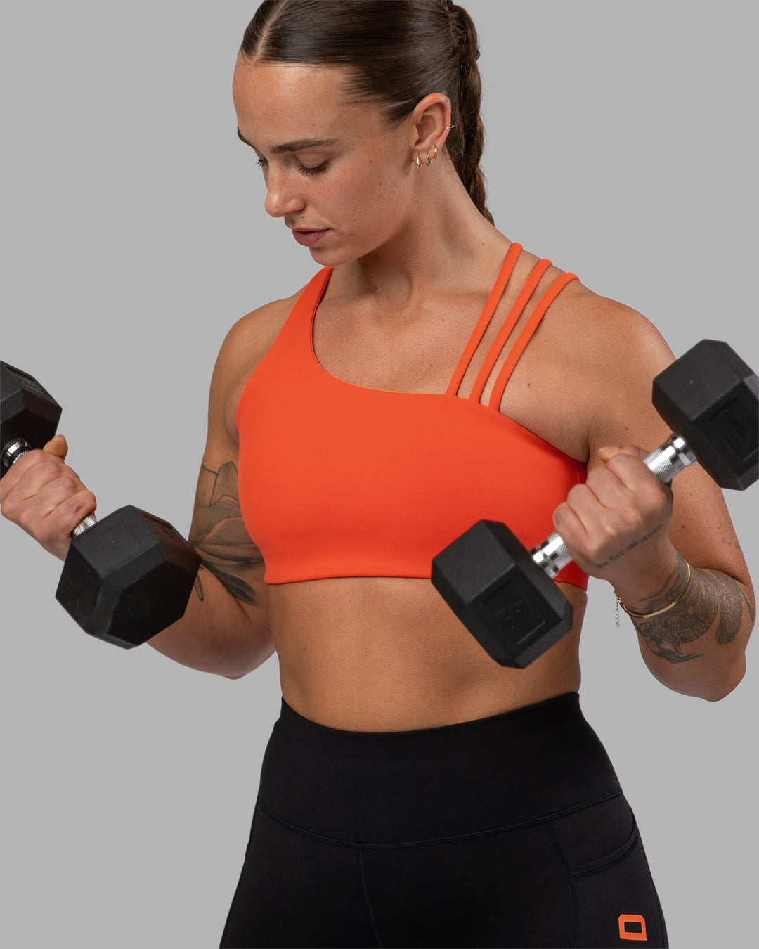 Woman wearing Galvanise Sports Bra 2.0 - Ultra Orange | Model:Robyn | Size:S - view 5