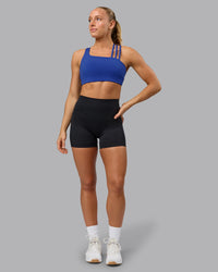 Woman wearing Galvanise Sports Bra - Power Cobalt | Thumbnail Index: 7