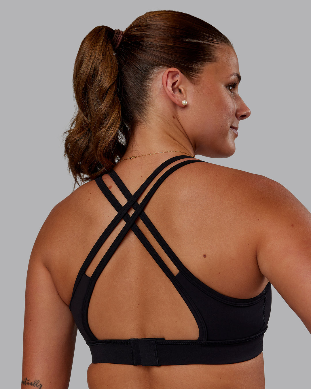 Woman wearing Genesis Layered Sports Bra - Black | Model:Phoebe | Size:S - view 2