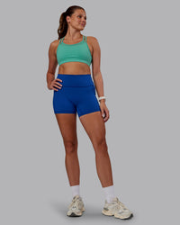 Woman wearing Genesis Layered Sports Bra - Agate Green | Model:Phoebe | Size:S | Thumbnail Index: 2