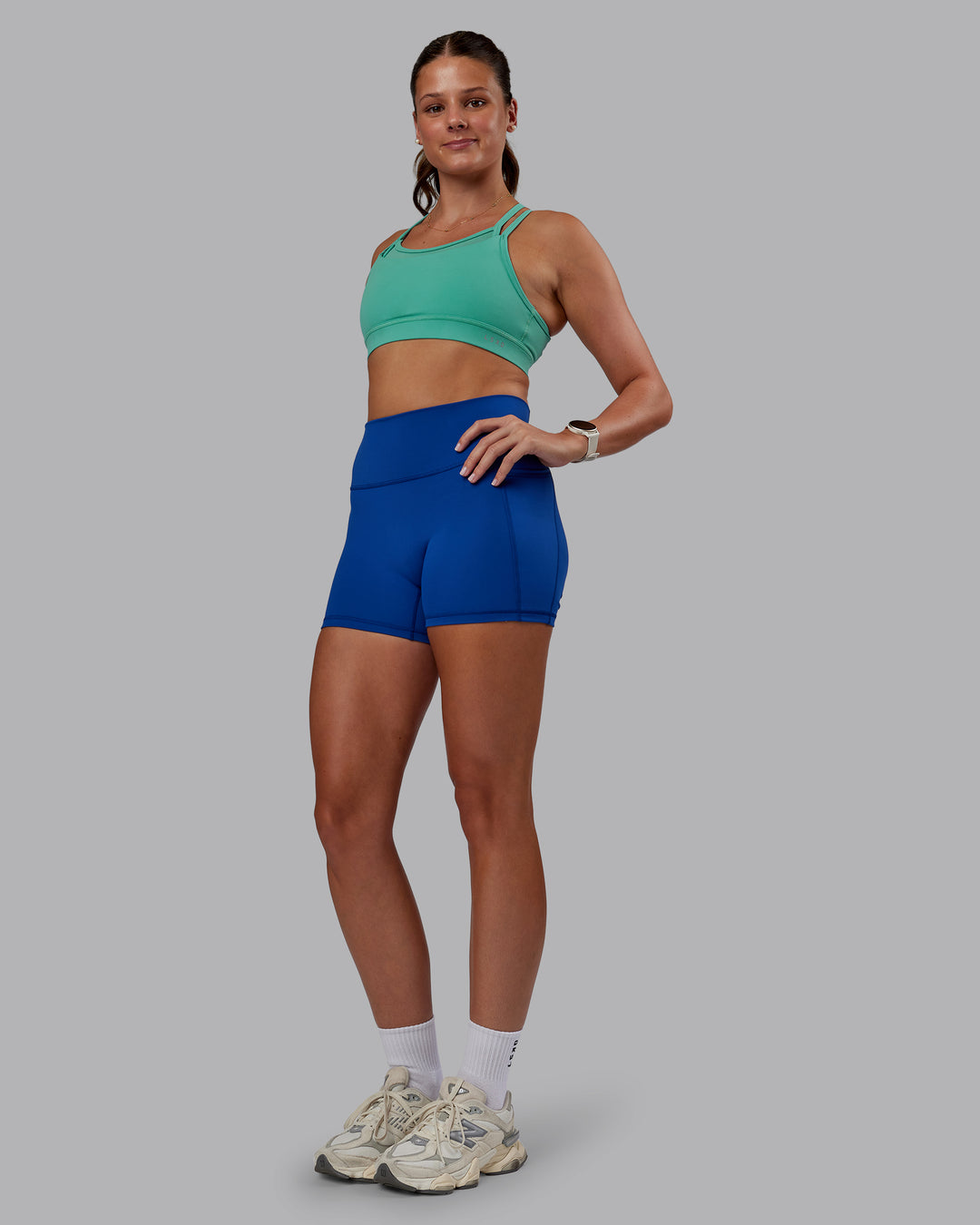 Woman wearing Genesis Layered Sports Bra - Agate Green | Model:Phoebe | Size:S - view 5