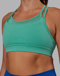 Woman wearing Genesis Layered Sports Bra - Agate Green | Model:Phoebe | Size:S | Thumbnail Index: 3